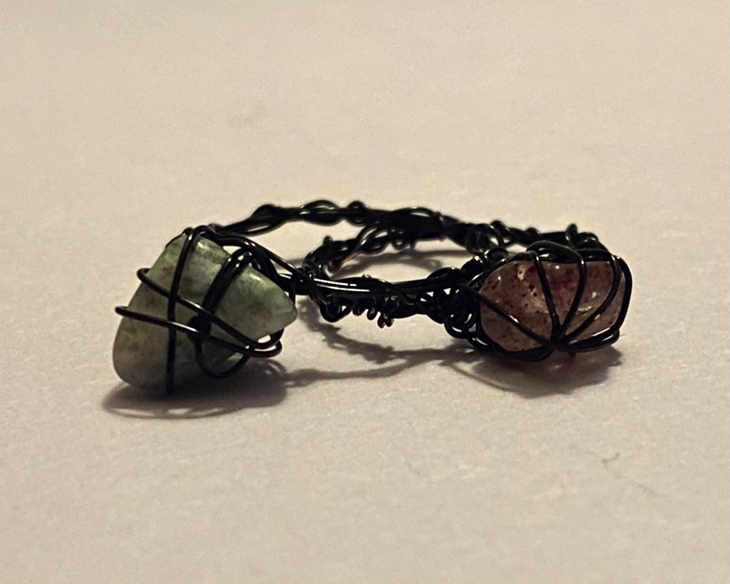 black wire and stone ring
