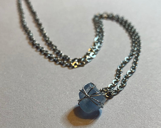 silver chain and stone necklace